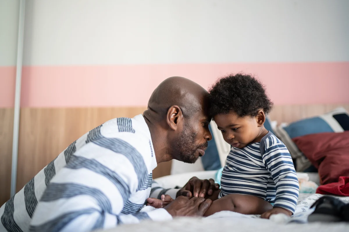 Dad talking to toddler