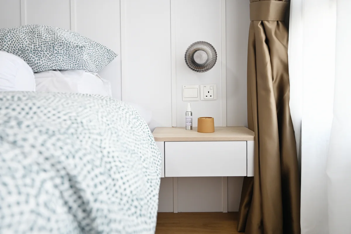 Bedside table and night light in a new home
