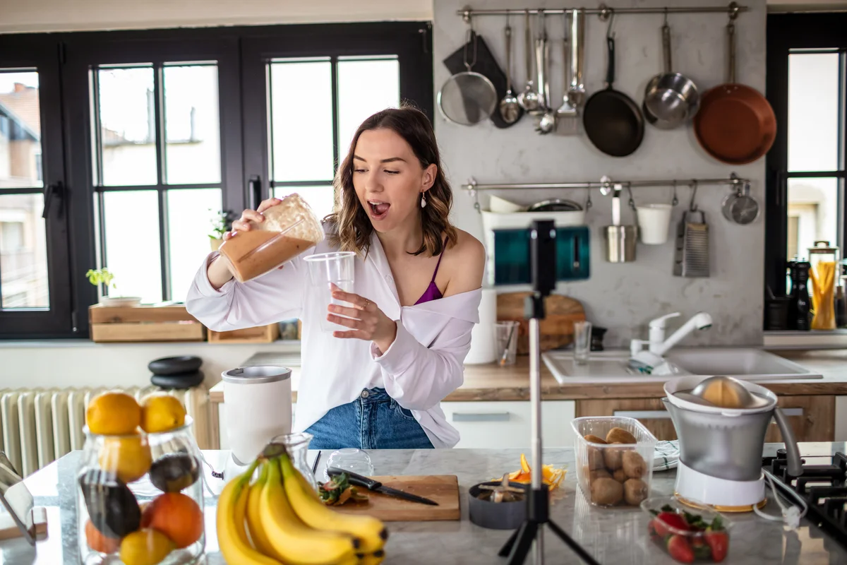 Photo of young woman in kitchen