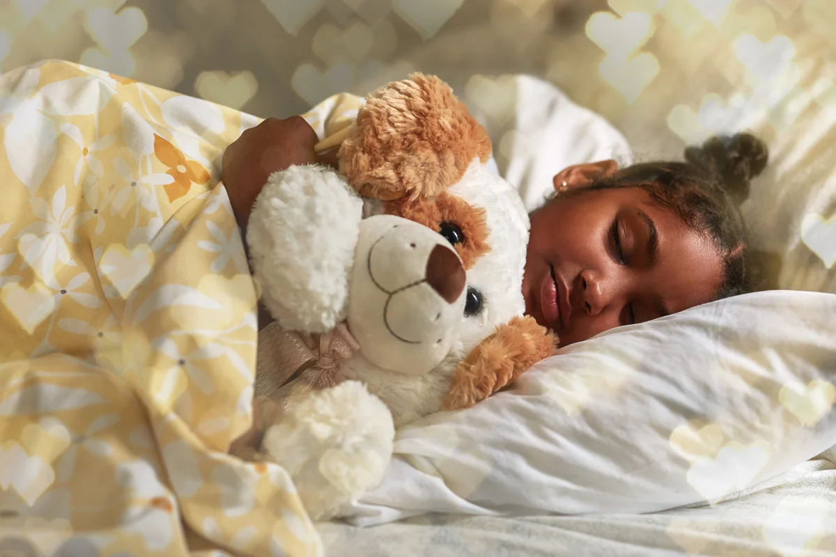 kid with stuffed dog