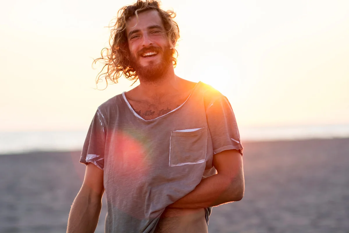 Happy man at the beach