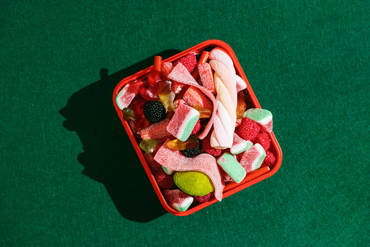 red plastic box filled with gummy candies
