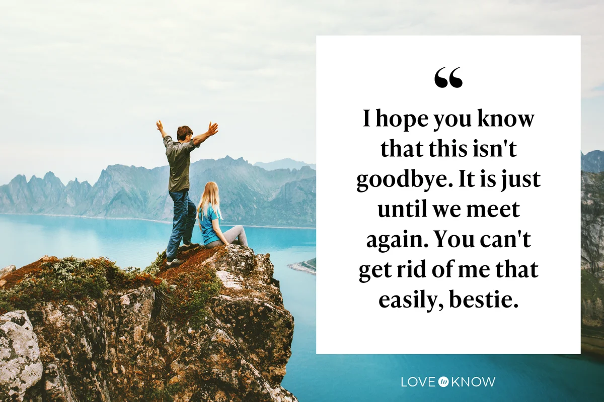 Travel couple enjoying view together on cliff edge