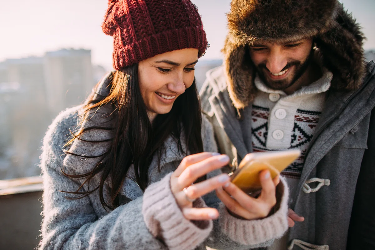 young people exchanging phone numbers