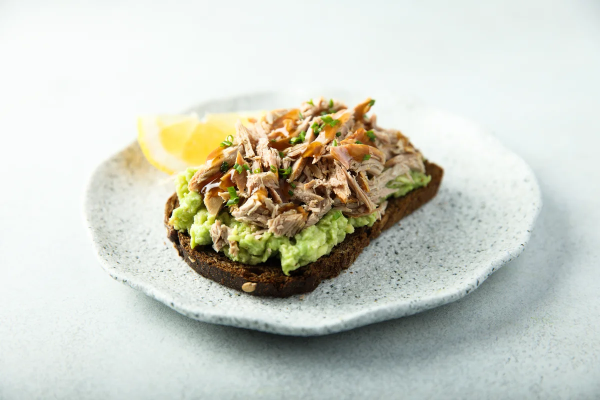 Avocado toast with meat on top