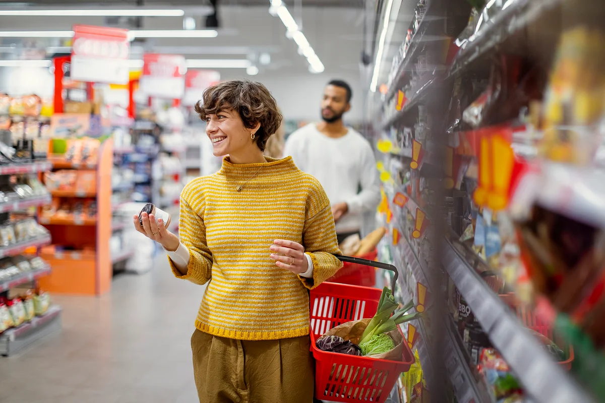 Young woman shopping in the supermarket