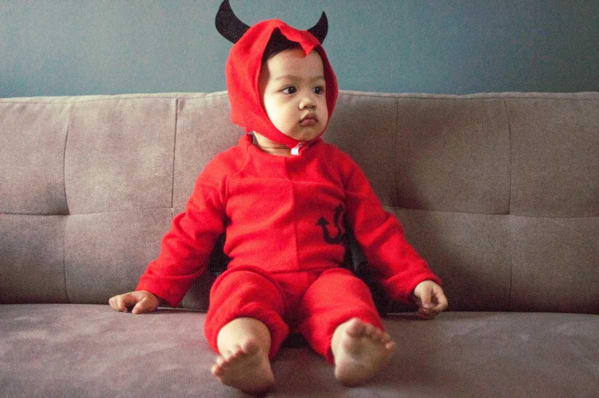 Baby in devil costume