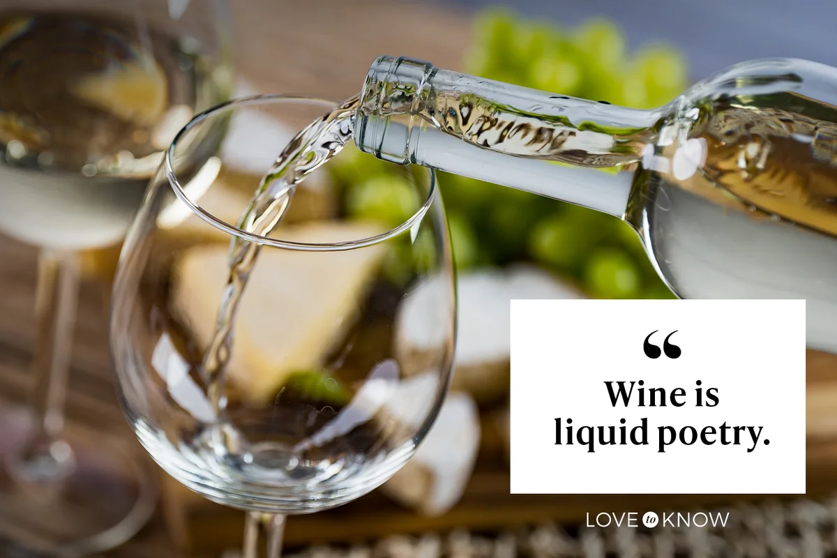 Pouring white wine into the glass