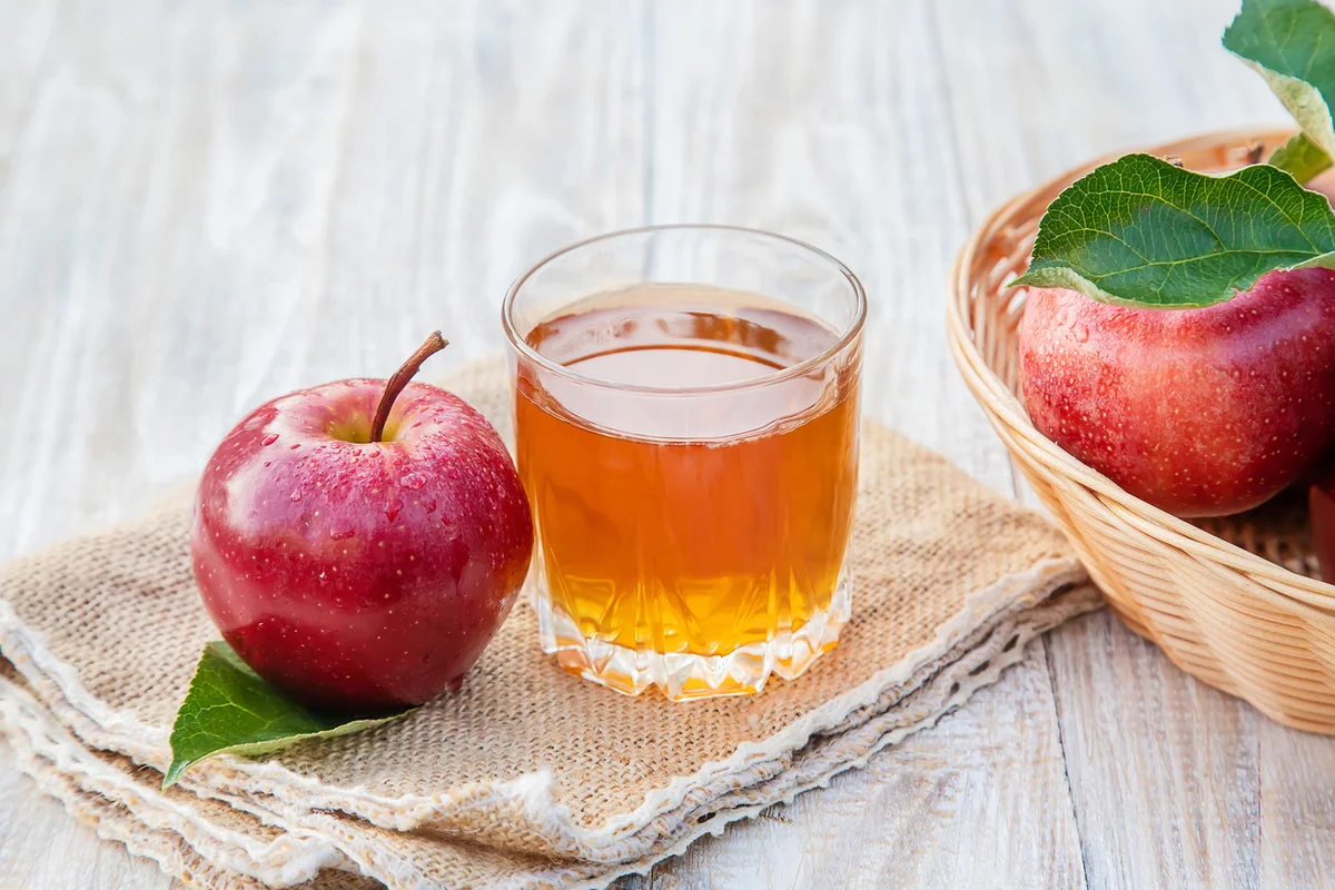 Apple juice in a glass Selective focus
