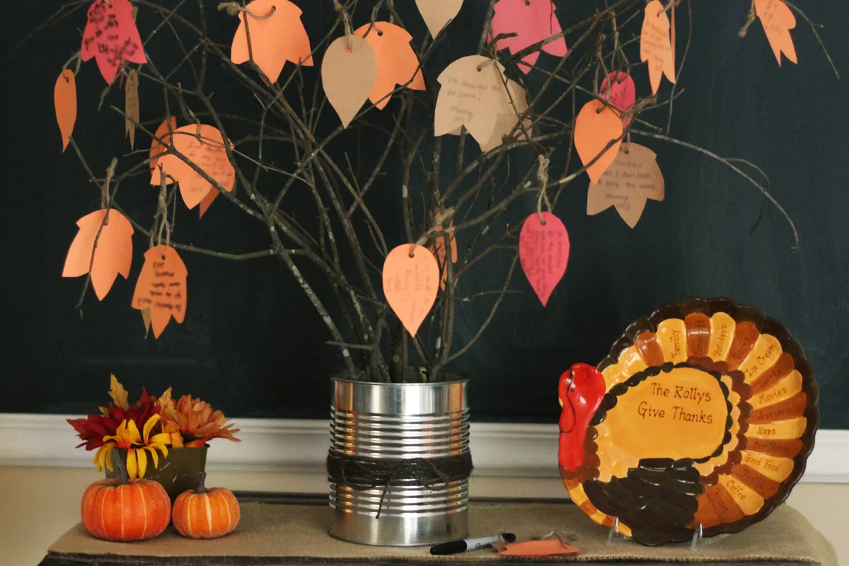 gratitude tree and a personalized turkey serving platter with mini squash decorations