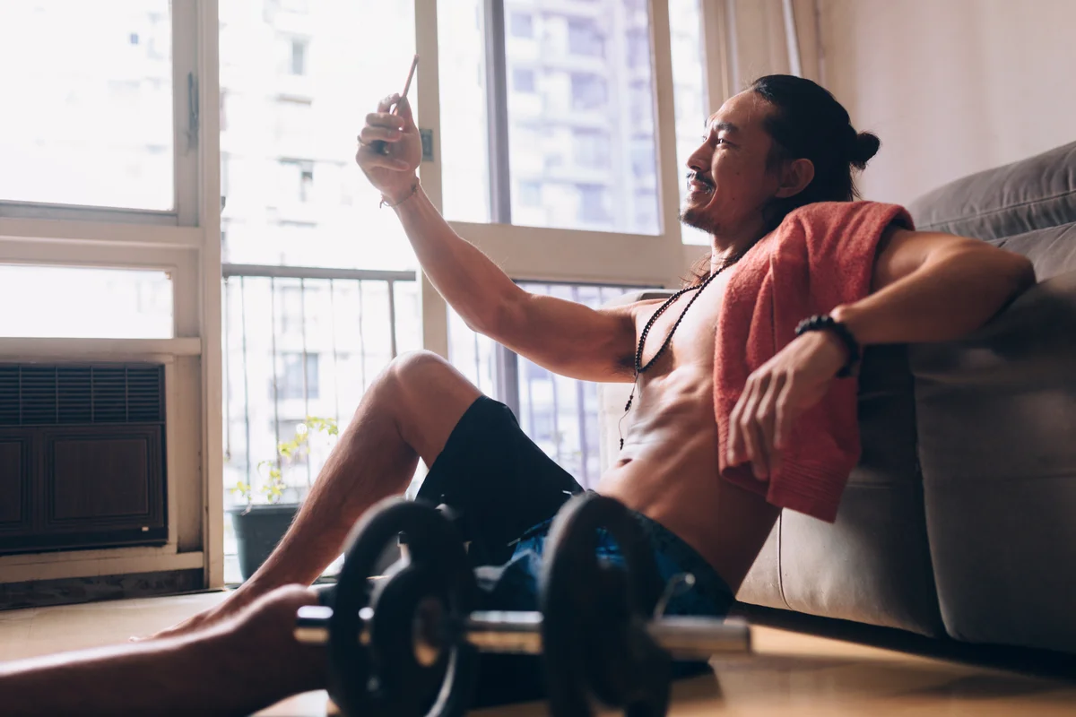 Man taking a selfie after exercise at home