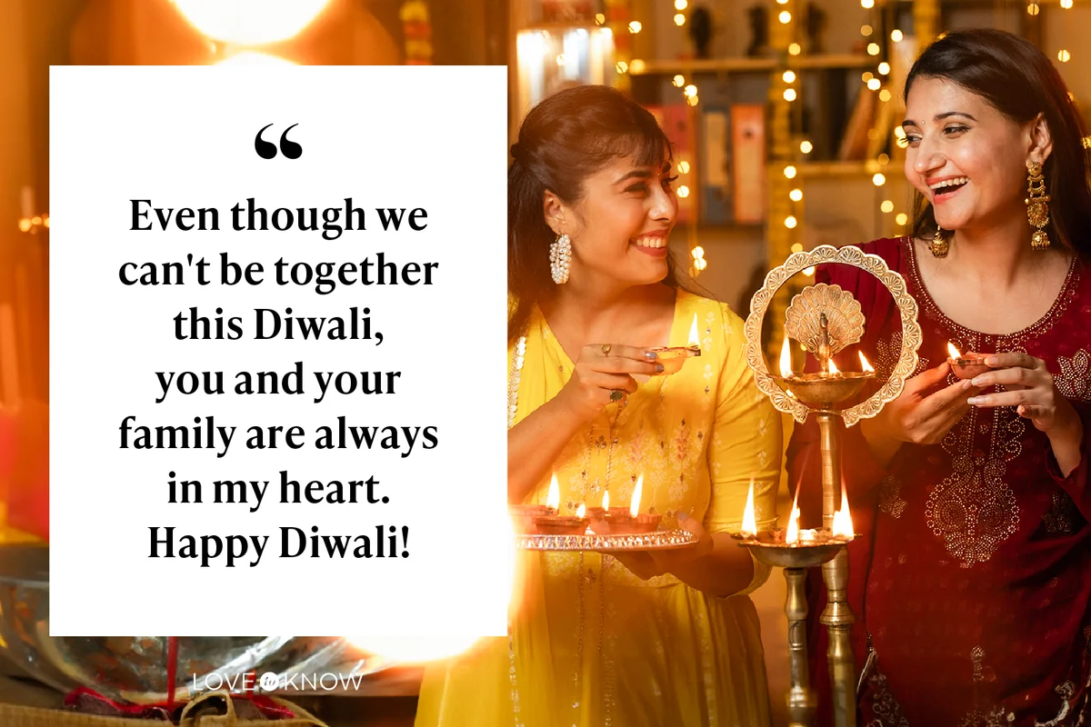Happy sisters lighting diyas at home during Diwali