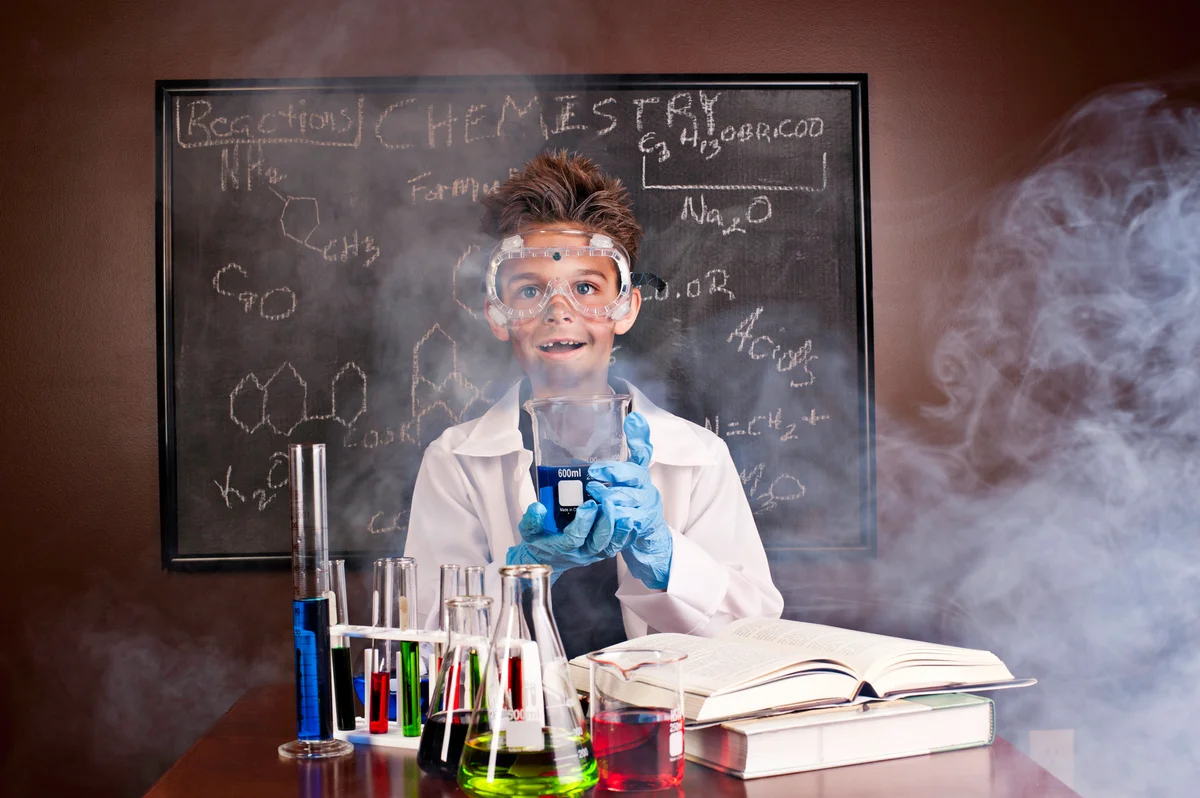 kid with chemistry set