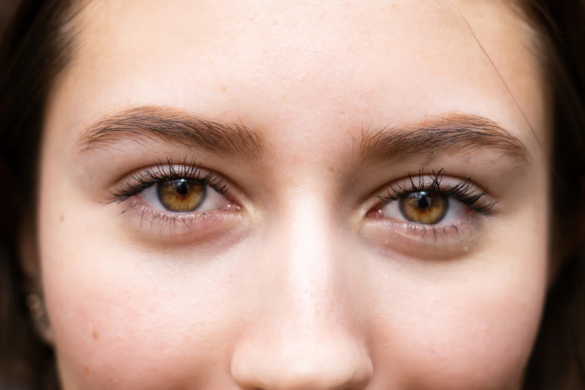 the eye and nose of a young Latino woman