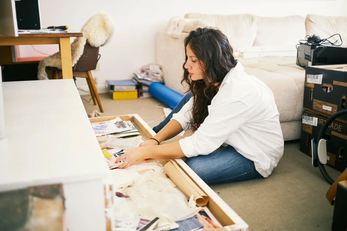 person sorting papers