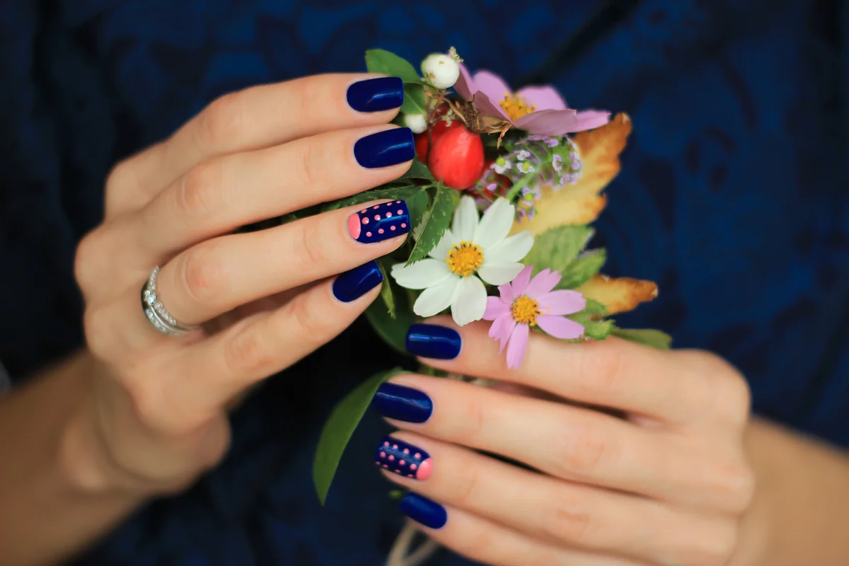 Autumn flowers in the hands