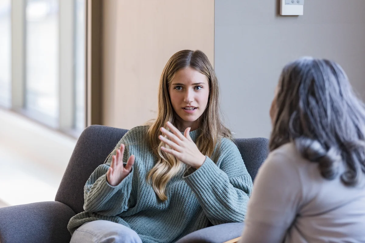 Woman talking to profesional therapist
