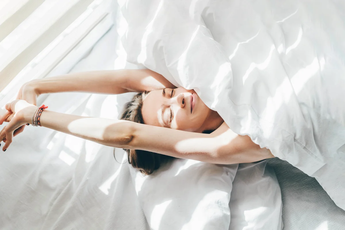 Woman waking up in the morning