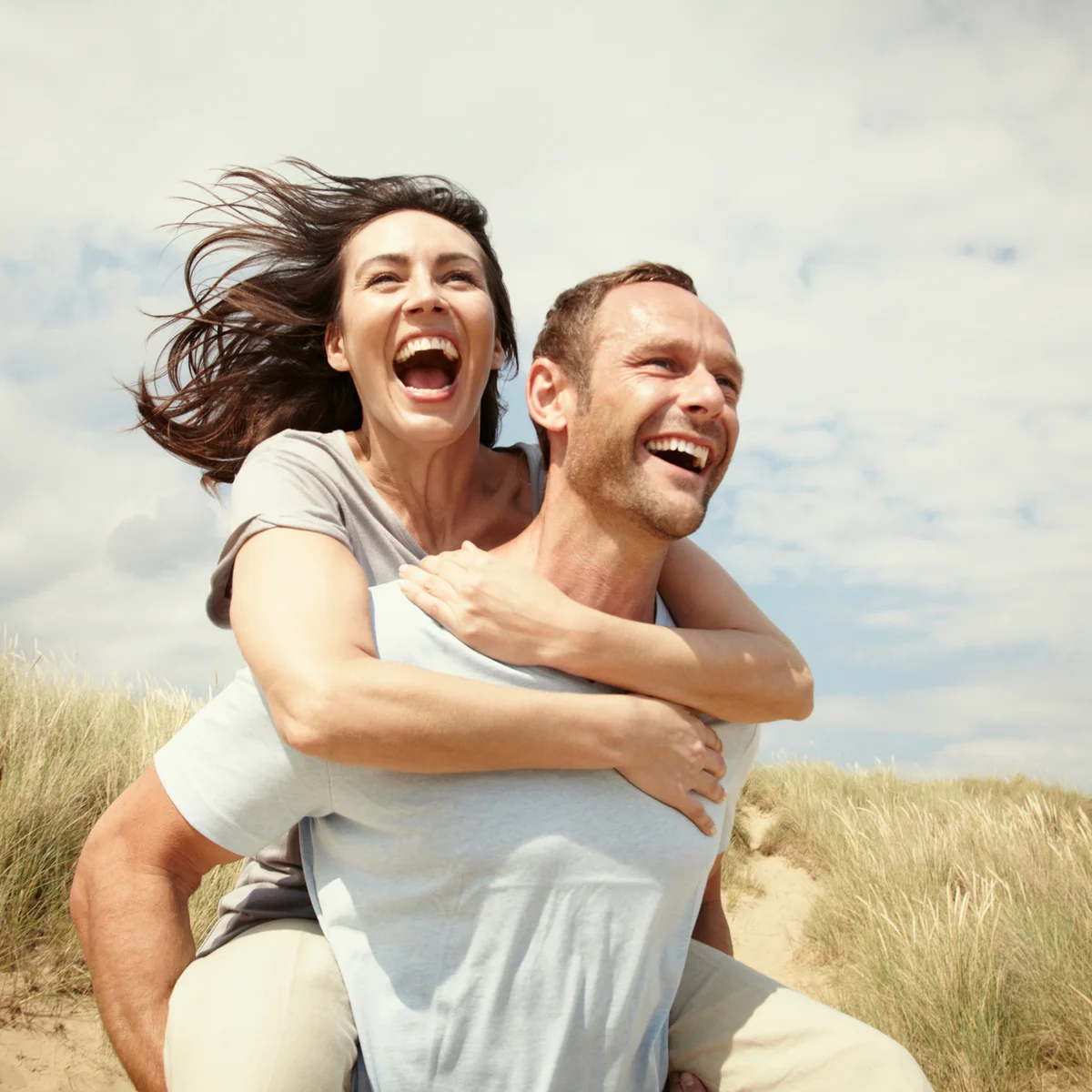 Couple enjoying day out at the beach