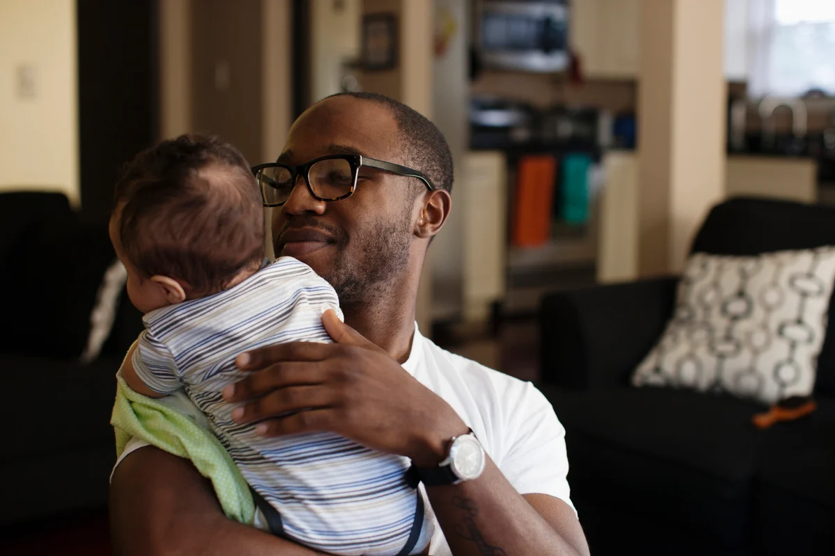 Father holding baby