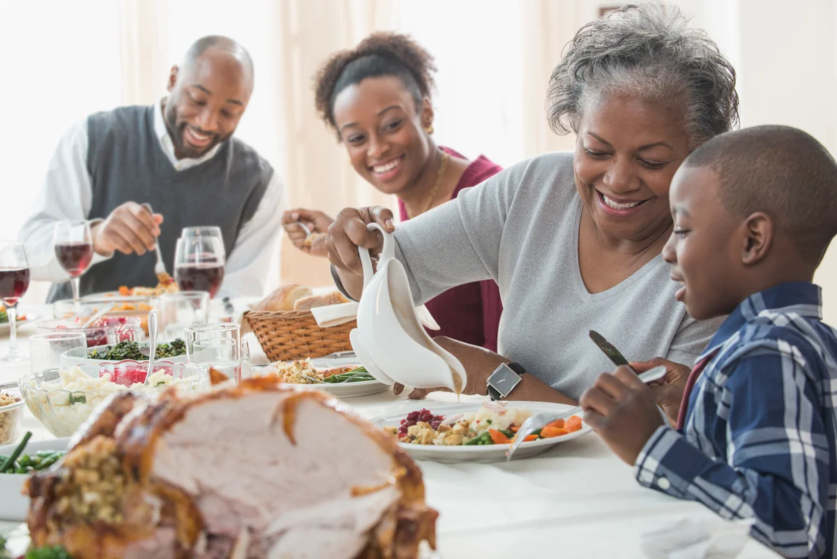 family enjoying Thanksgiving dinner