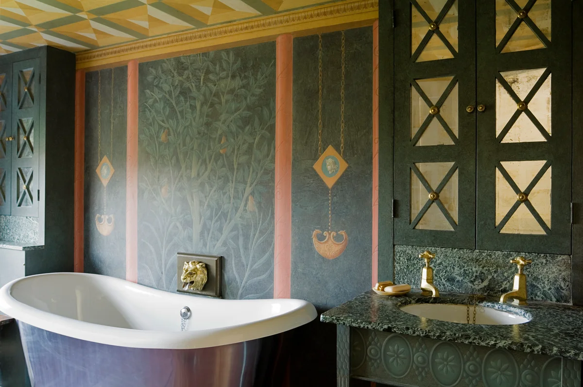 Bathroom with green wallpaper