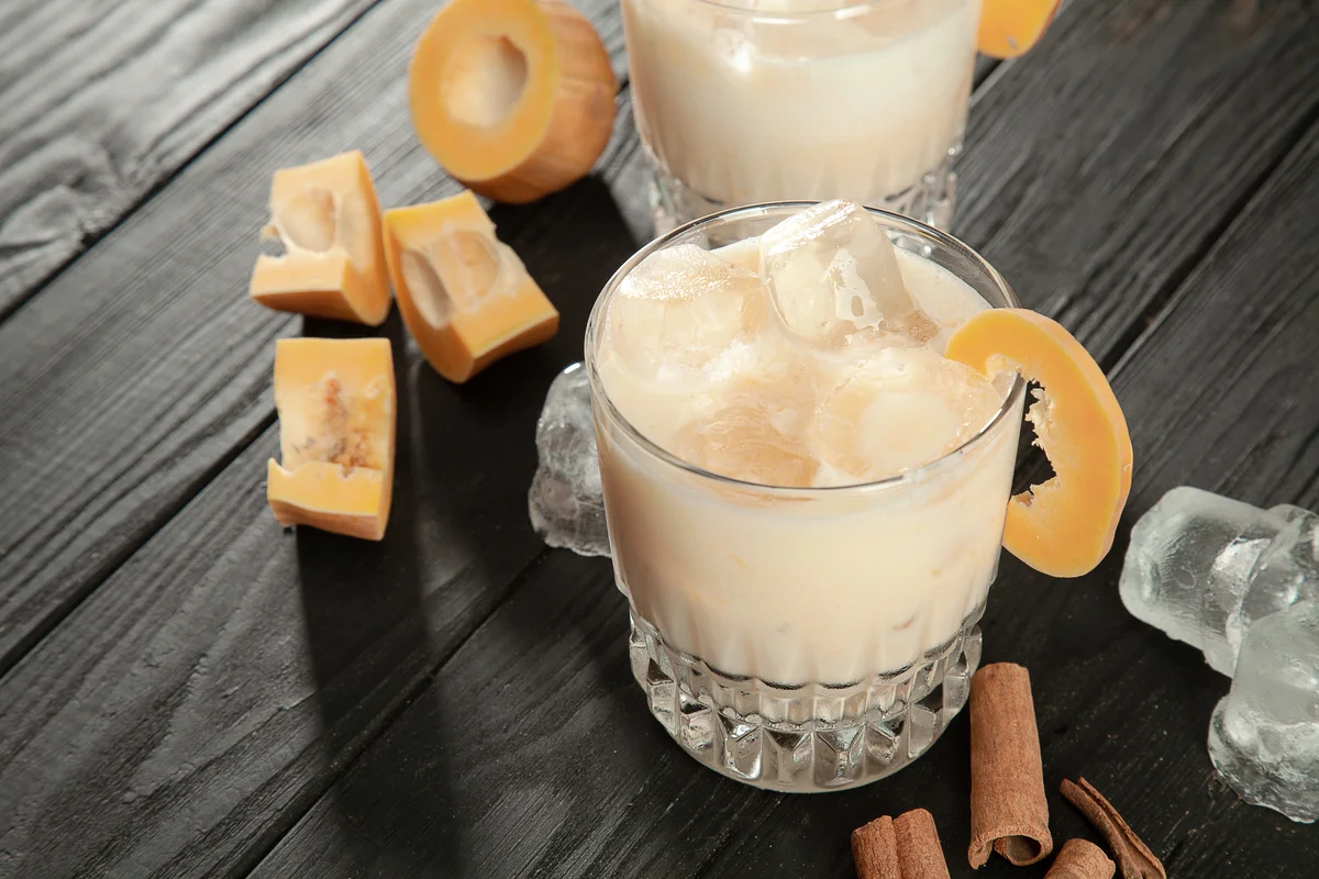 Glass with ice, pumpkin and cinnamon