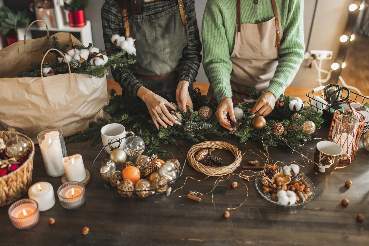 Women making christmas garland