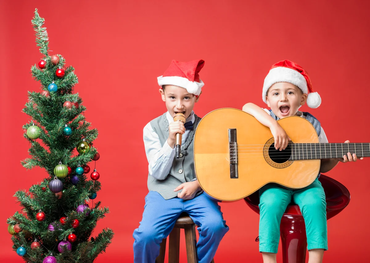 boys singing by tree