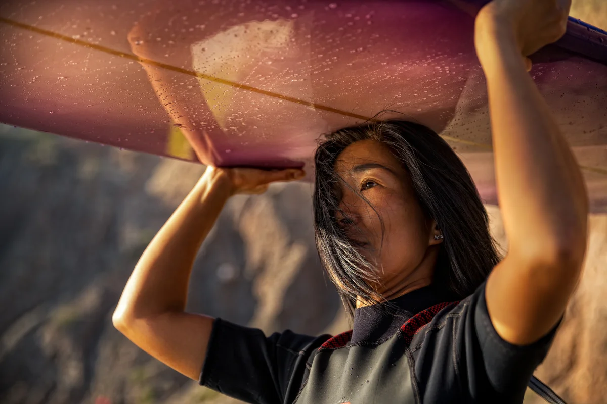 woman with surfboard