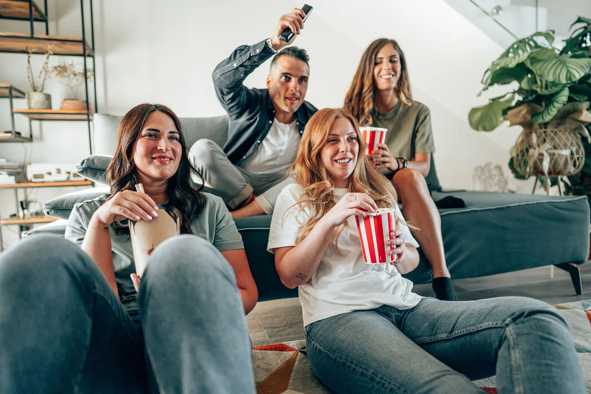 Friends all together watching a movie