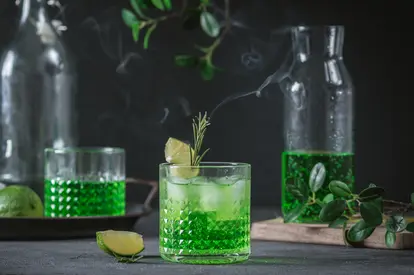 Close-up of green drink on table