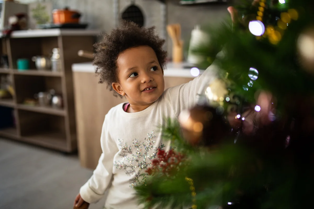 Toddler Decorating Christmas Tree