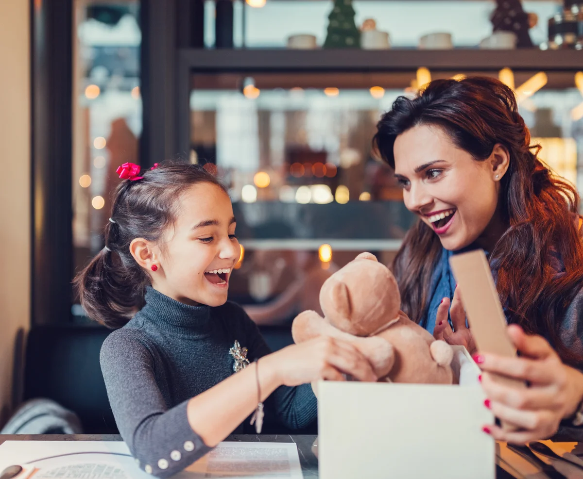 Little girl enjoying a christmas gift