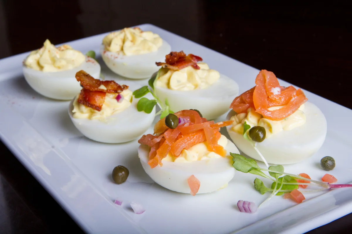 Deviled eggs with various toppings