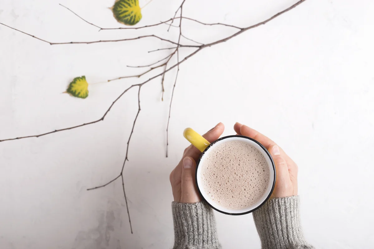 hands holding hot chocolate