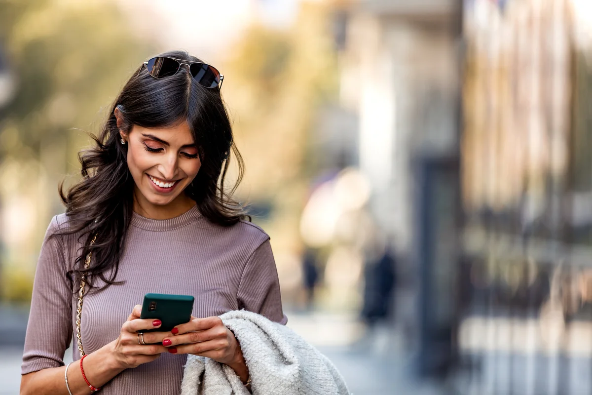 woman texting on her phone