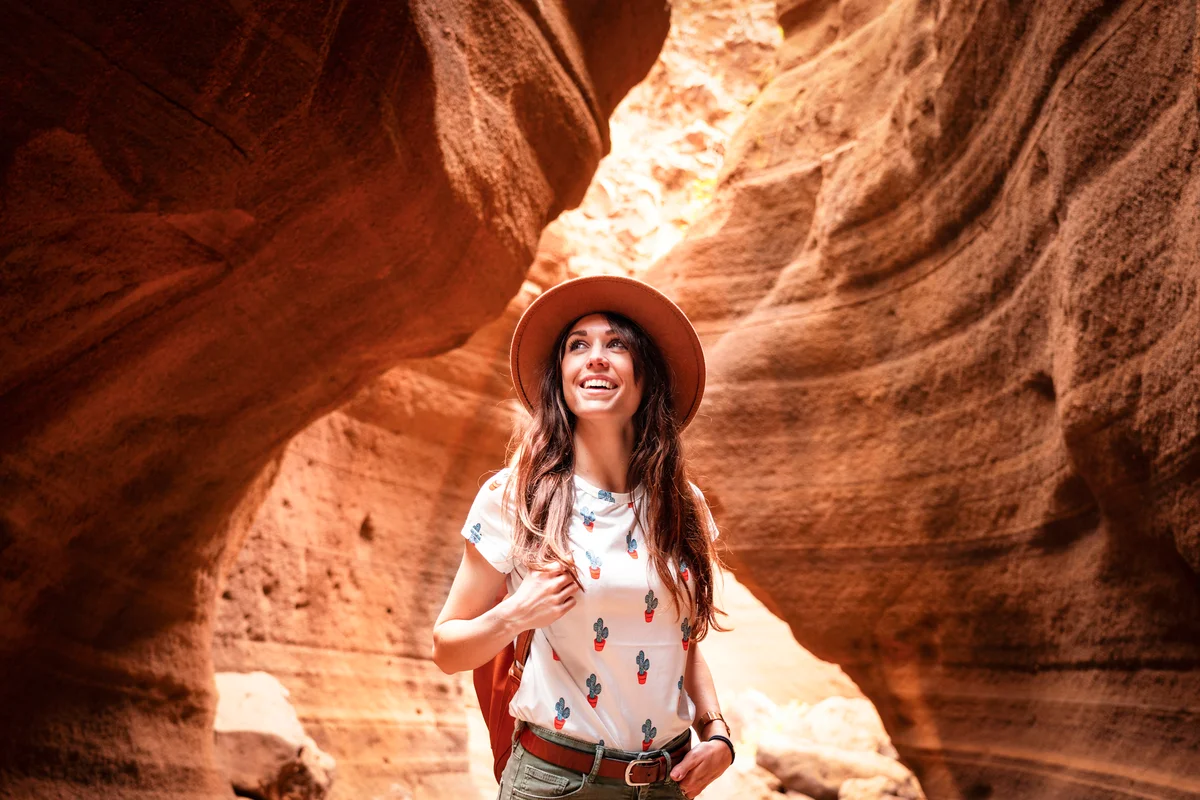 woman in a slot canyon