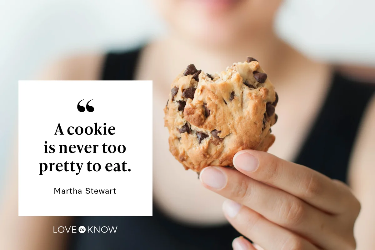 Woman holding a freshly baked cookie