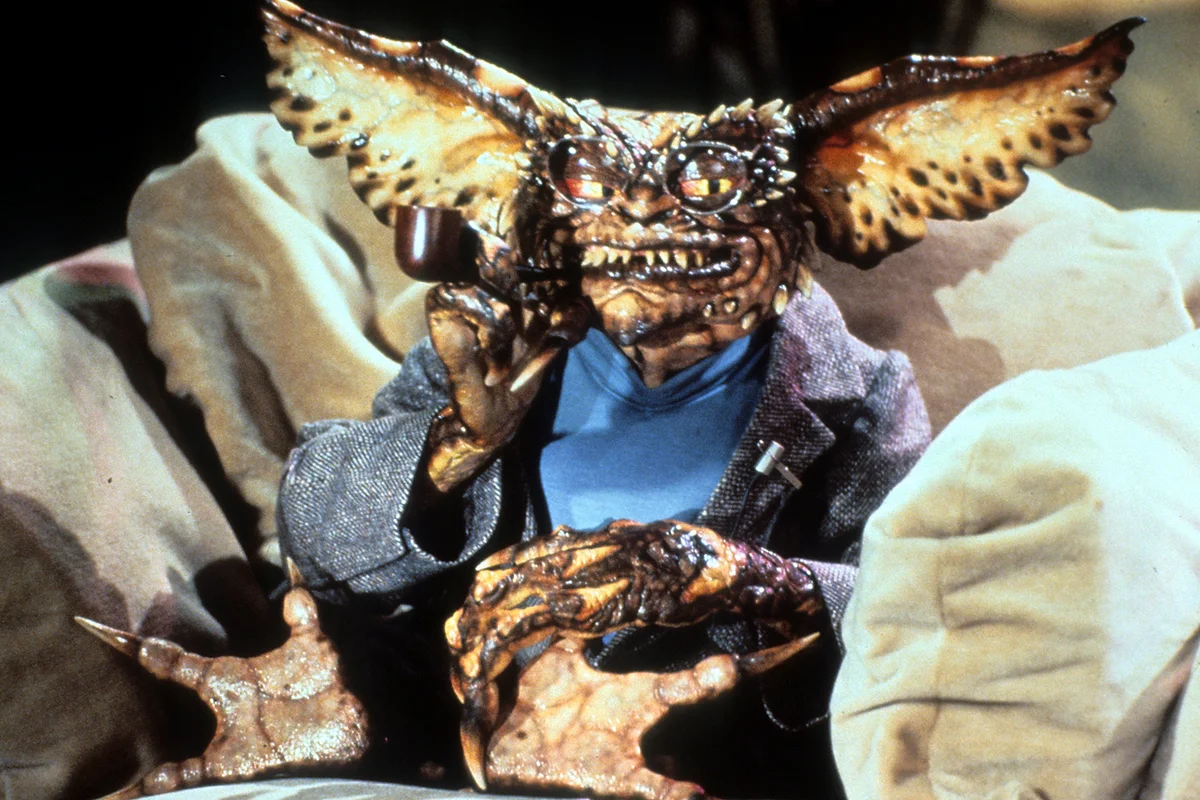 A gremlin smokes a pipe