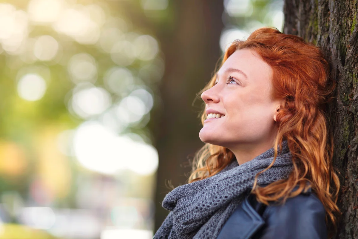 Woman enjoying a sunny day in the park