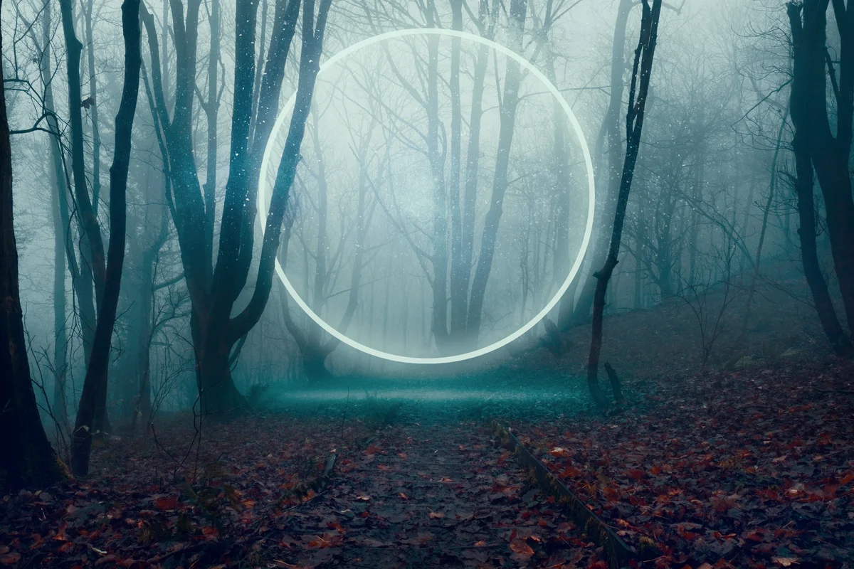 A glowing, portal, gateway floating above a track
