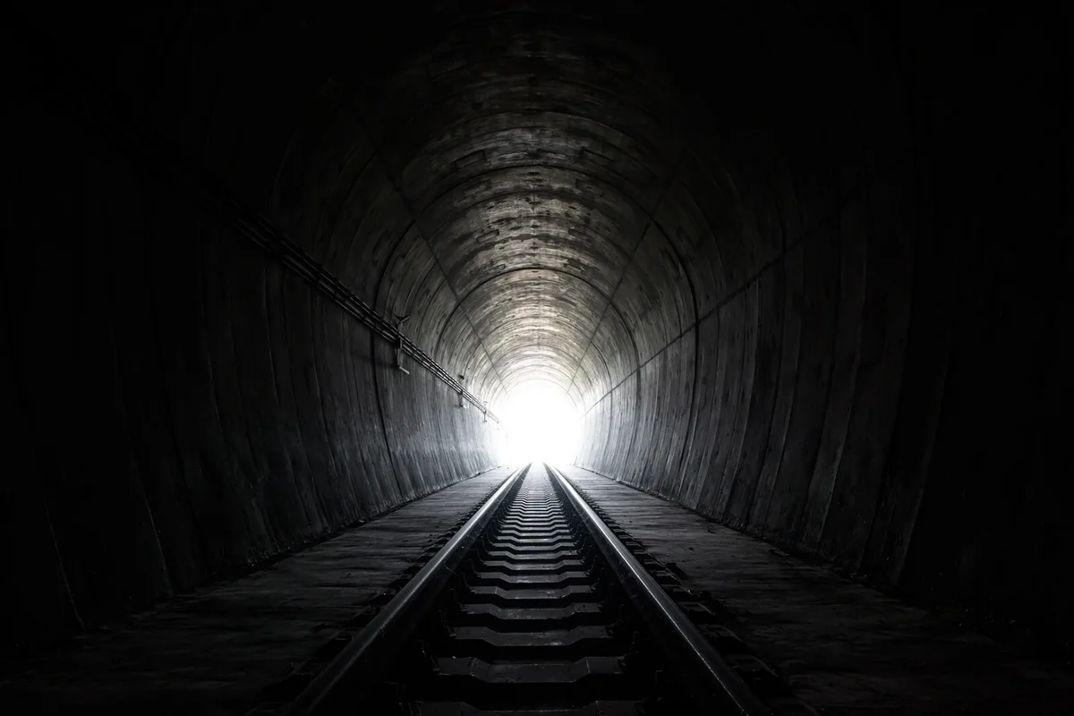 View Of Railroad Tracks In Tunnel