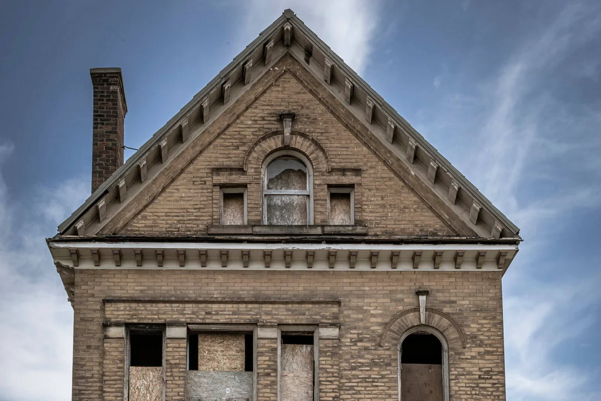 Boarded up and abandoned home