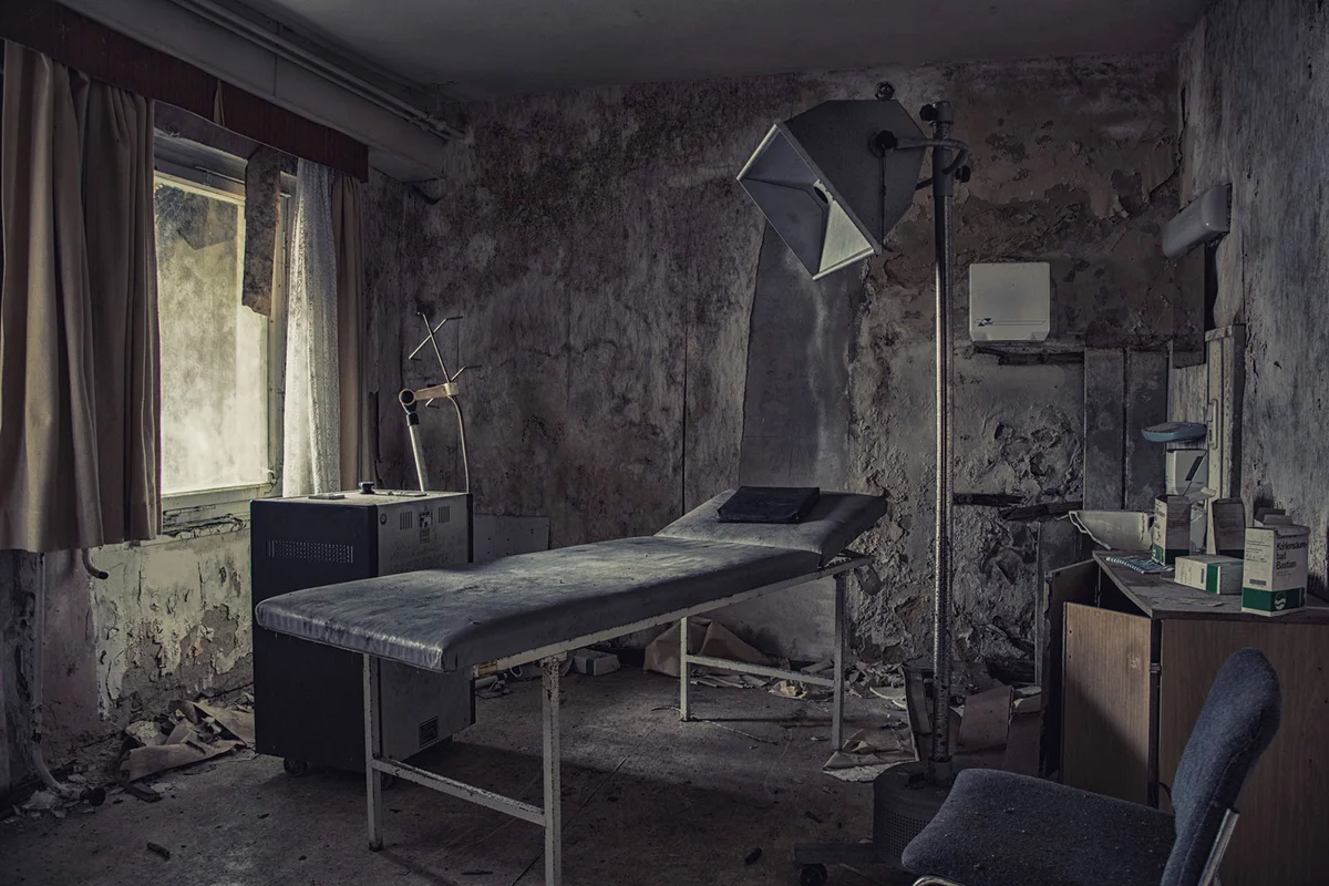 Interior of abandoned operating room in hospital