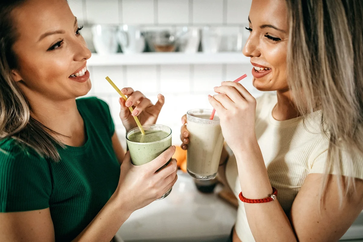 Girls drinking smoothie for morning breakfast