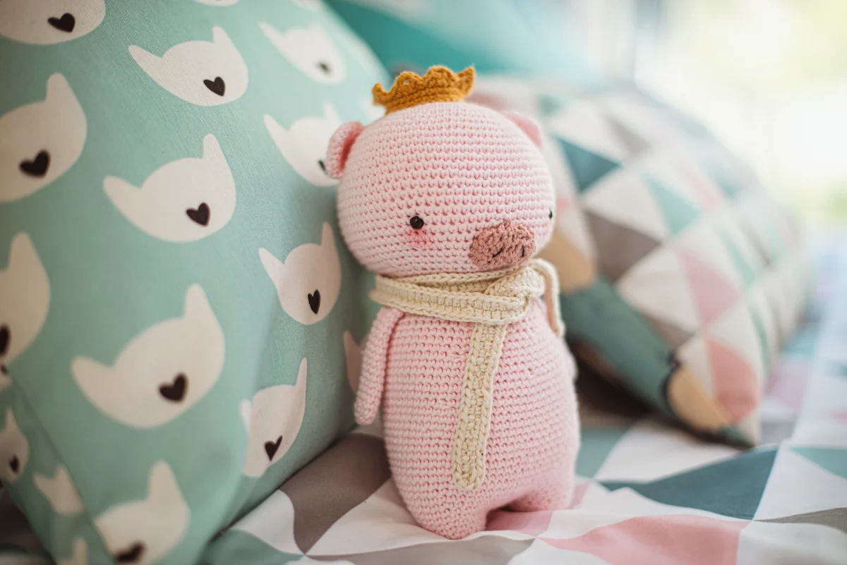 Close-up of a homemade crochet pig