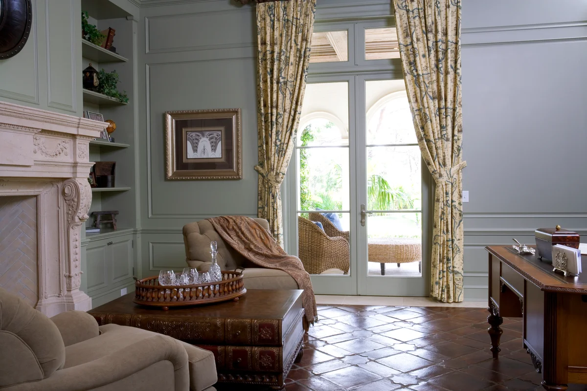 White and tile living room with novelty book table