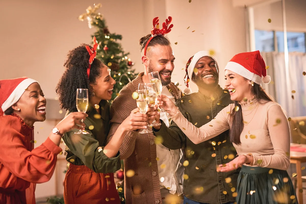 Christmas and friends with drinks and group of people with love