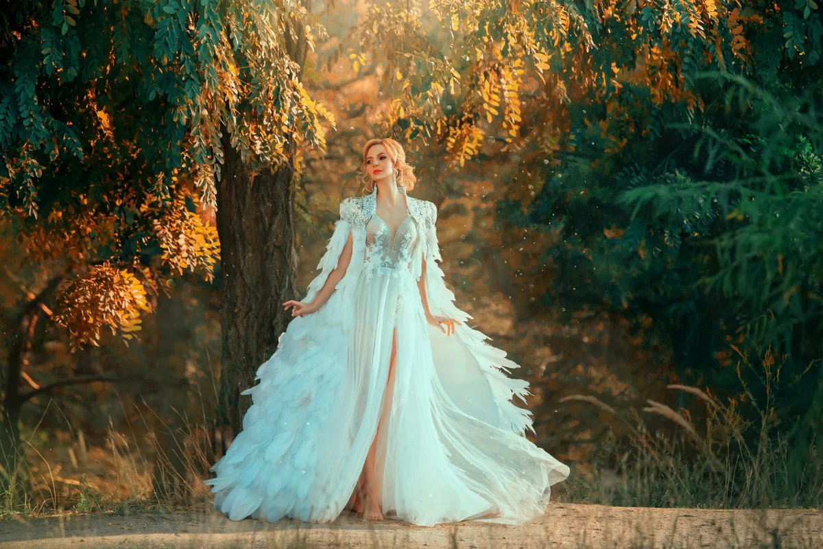 Bride in incredibly dress with feathers